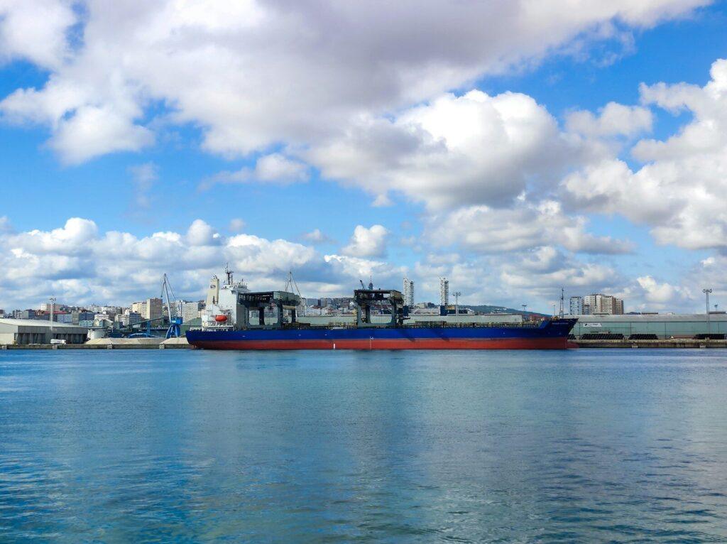 A large cargo ship in a large body of water