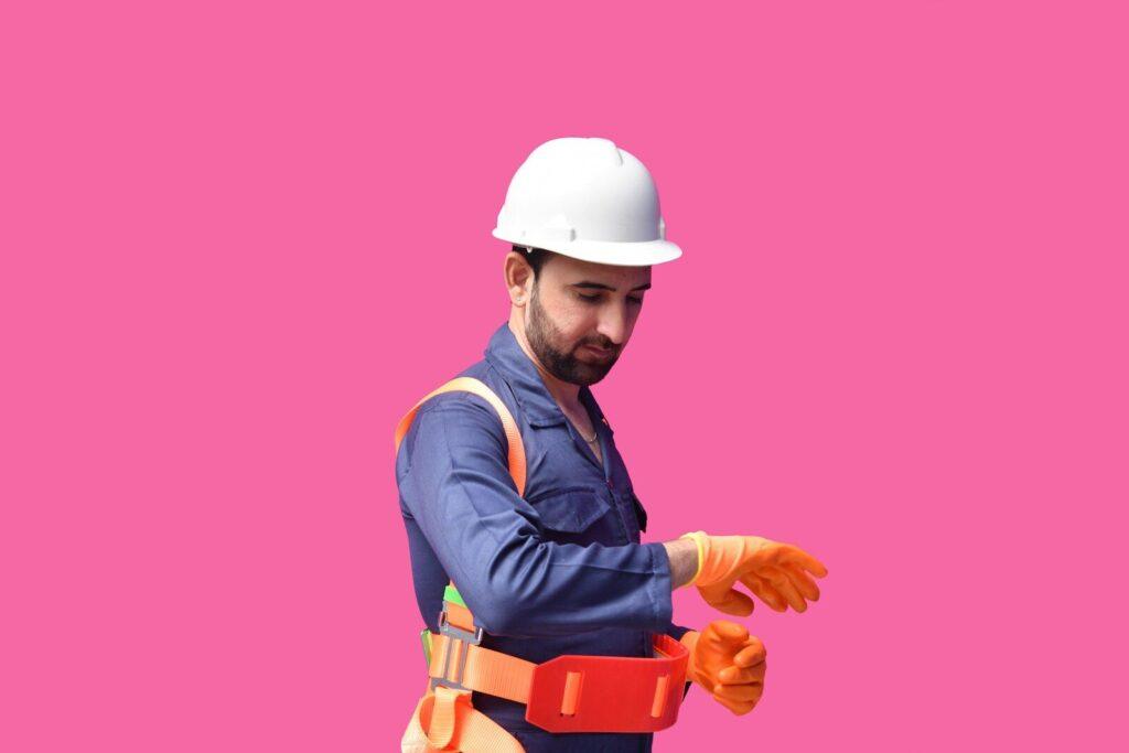 a person wearing a hard hat and safety gear